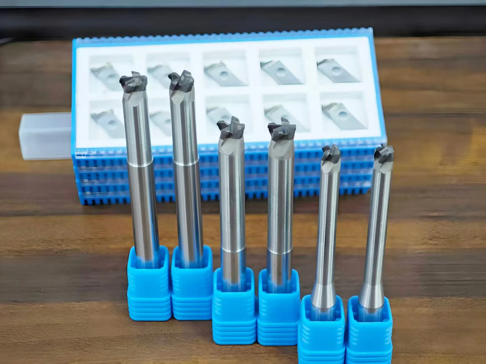 Six solid PCD milling tools with varied cutting head sizes